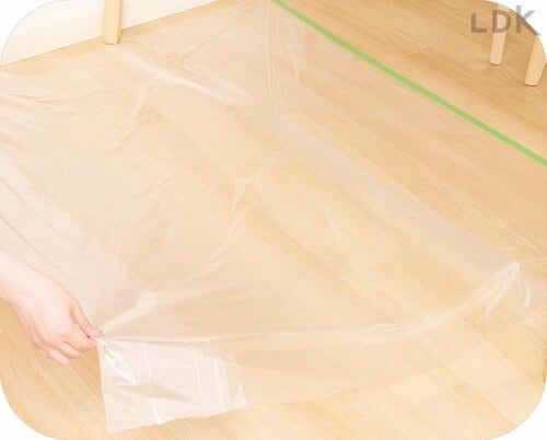 2:テープ部分を床に貼りシートを広げる イメージ